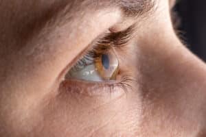 A close-up shot of a brown eye